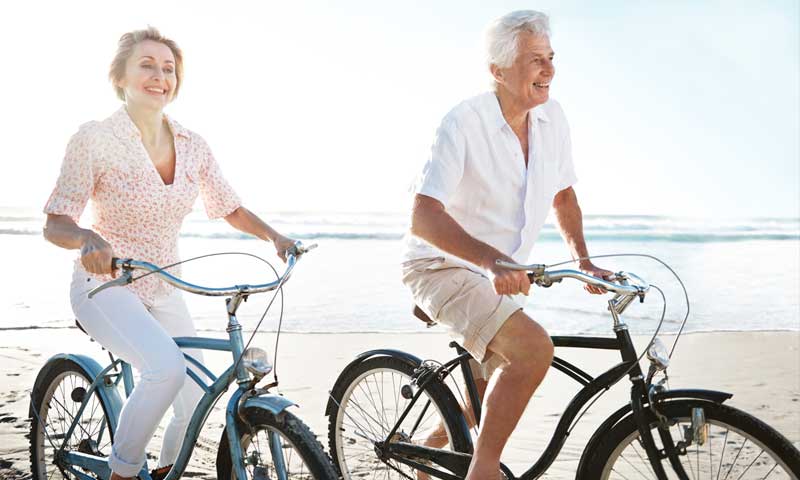 exercises that are good for vein health, seniors riding bikes on the beach