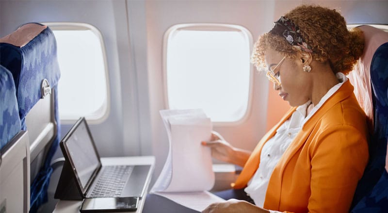 woman traveling on airplane